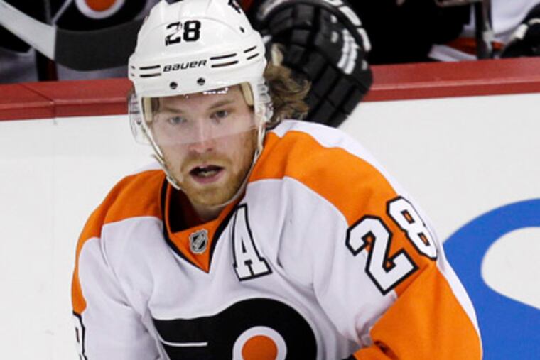 Flyers center Claude Giroux has 18 goals and 30 assists in 37 games. (Gene J. Puskar/AP Photo)