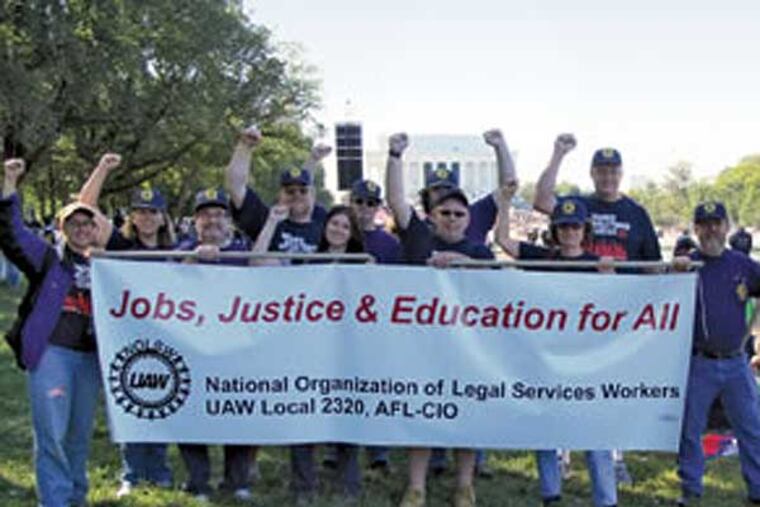 Members of UAW Local 2320 in New York, nearly half of whom are lawyers, voted to strike this month, after their employer, Legal Services NYC, pushed for cuts to benefits in a recent contract negotiation. (Photo from UAW.org)