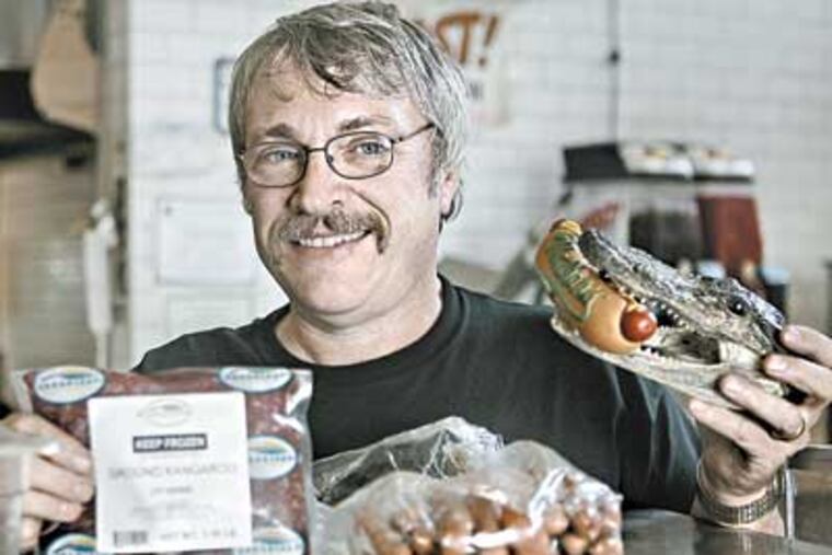 Kerry Yobb, who sells hot dogs at the Grand Marketplace, has added exotic meats, such as alligator and kangaroo. He once headed the Pennsauken Mart Merchants Association. (AKIRA SUWA / Staff Photographer)