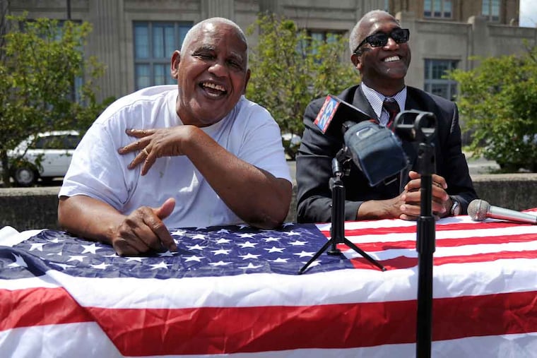 Milton Street (left) says he is not running for Pennsylvania's 2nd congressional district, but endorses James Jones (right) for the seat once held by Chaka Fattah at a joint news conference in a shopping center parking lot at 22nd and Lehigh Streets.