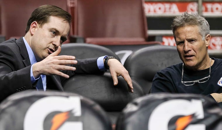 Sixers GM Sam Hinkie (left) and coach Brett Brown oversaw the early Process years.