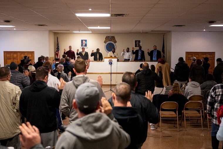 Richard Hooker Jr., 40, Secretary Treasure & Principal Officer, has union members stand up to take the oath of membership at the first slate meeting at Teamsters Local 623 Union Hall on Saturday, Jan. 18, 2020. Philadelphia City Council is correct to prioritize workers' rights, he writes with fellow union leader Jed Dodd.