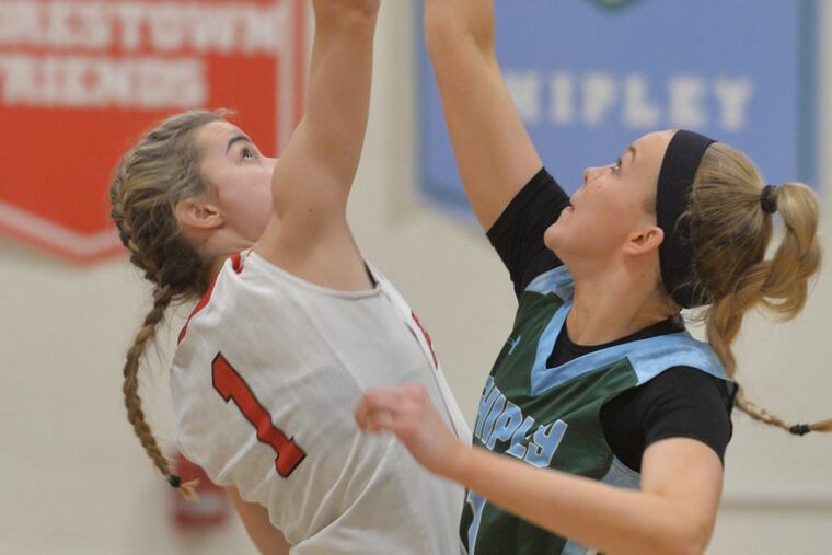 #1 Elle Stauffer of Germantown Academy fights for the opening jump against #11 Anna Camden of The Shipley School.Girls Basketball game between Shipley and Germantown Academy played At the Westtown School in West Chester, Pa Shipley was victorious . November, 23rd 2018 (Bob Williams /For the Inquirer)