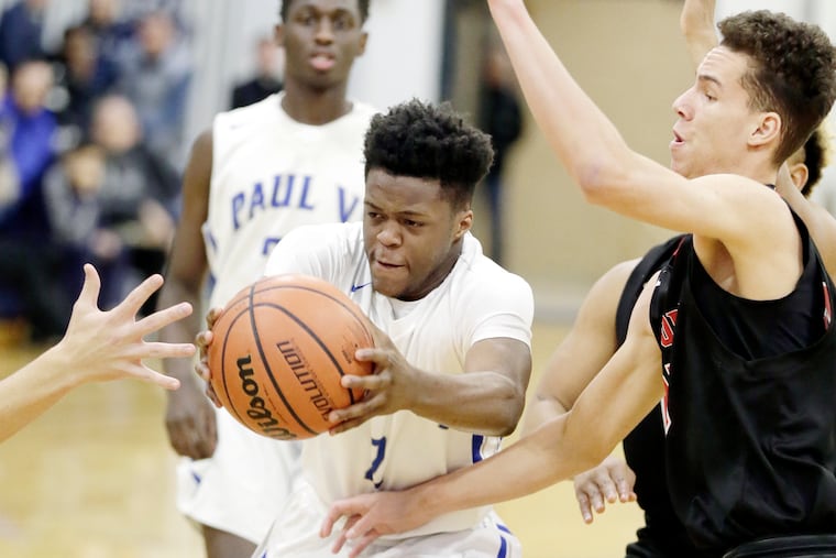 Paul VI senior Tyshon Judge powers through traffic against Haddonfield in the Shoot Down Cancer Classic at St. Augustine Saturday. Paul VI won, 59-52.