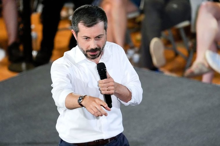 Former Transportation Secretary Pete Buttigieg calls on an audience member to ask a question during a town hall hosted by VoteVets on May 13, 2025, in Cedar Rapids, Iowa.