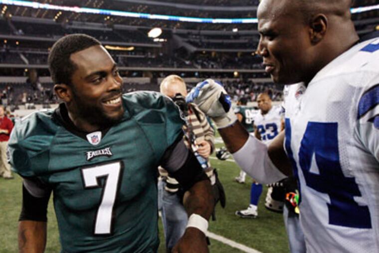 Mike Vick and the Eagles don't seem to be carrying themselves like a team that fell short of expectations. (AP Photo/Brandon Wade)