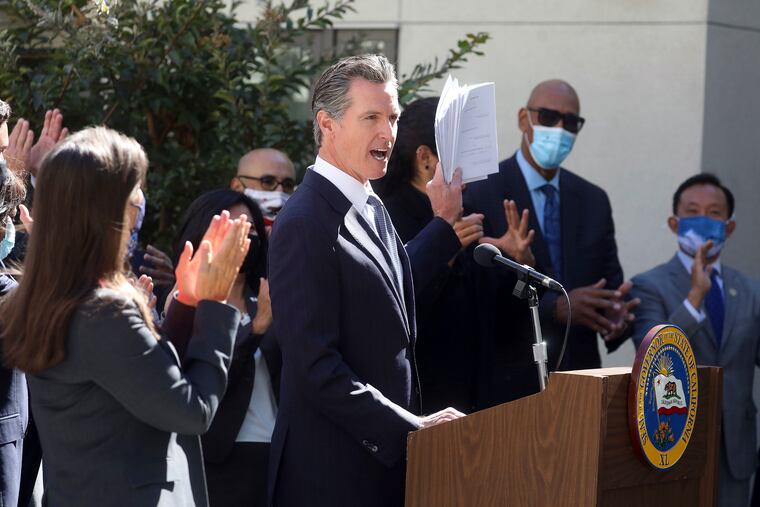 California Gov. Gavin Newsom, shown speaking at a news conference Tuesday.