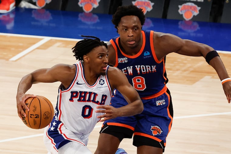 Tyrese Maxey of the Sixers dribbles past New York's OG Anunoby during Game 5 at Madison Square Garden.