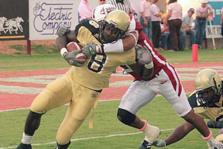 Martell Mallett (left) played college football at Arkansas-Pine Bluff before heading to the CFL. (David G Pierre/AP file photo)