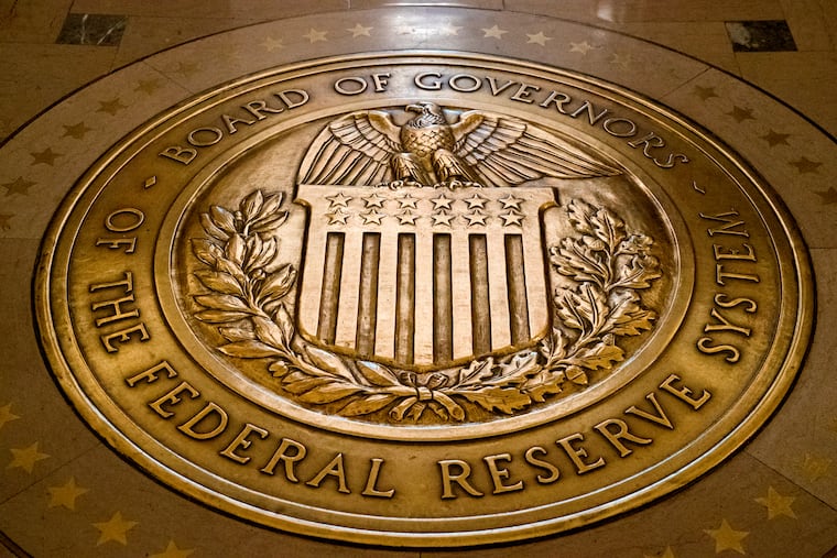 The seal of the Board of Governors of the United States Federal Reserve System is displayed at the Marriner S. Eccles Federal Reserve Board Building in Washington.