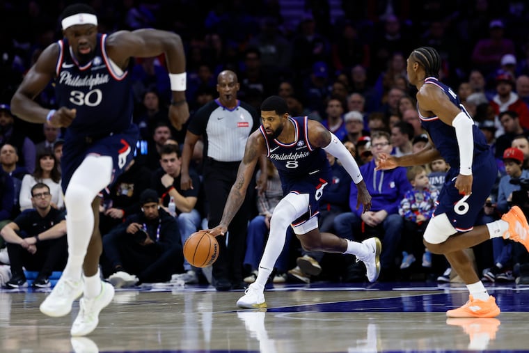 Sixers forward Paul George dribbles the ball up the court against the Atlanta Hawks on Sunday.