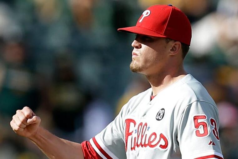 Philadelphia Phillies' Ken Giles celebrates after at the end of a baseball game against the Oakland Athletics, Saturday, Sept. 20, 2014, in Oakland, Calif. The Phillies won 3-0. (Ben Margot/AP)