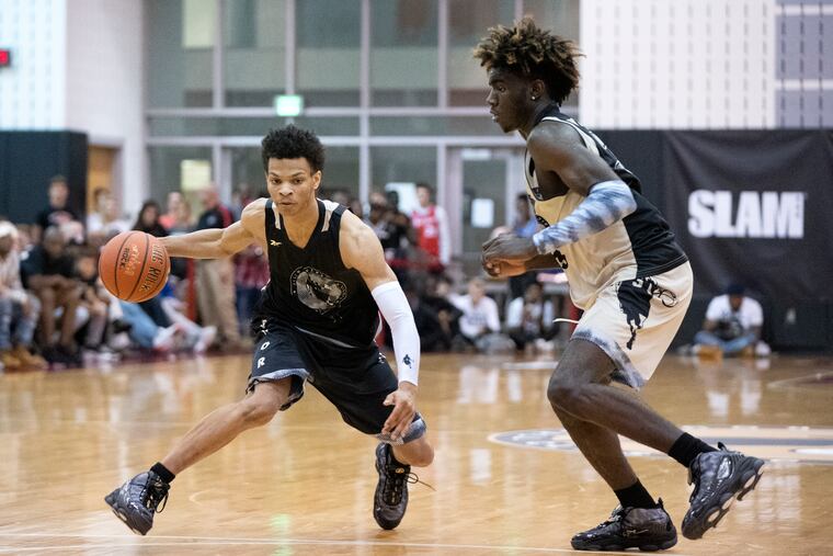 Isaiah Wong (left) of Bonner-Prendergast takes on Kahlil Whitney of Roselle Catholic during the Allen Iverson Roundball Classic at Souderton.
