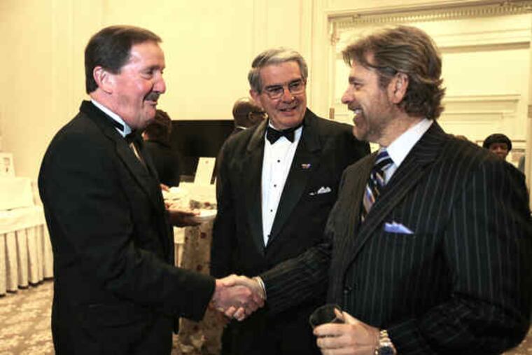 Herb Magee (left), Philadelphia U. coach, St. Joseph’s athletic director Don DiJulia, WIP’s Howard Eskin, at Coaches vs. Cancer.