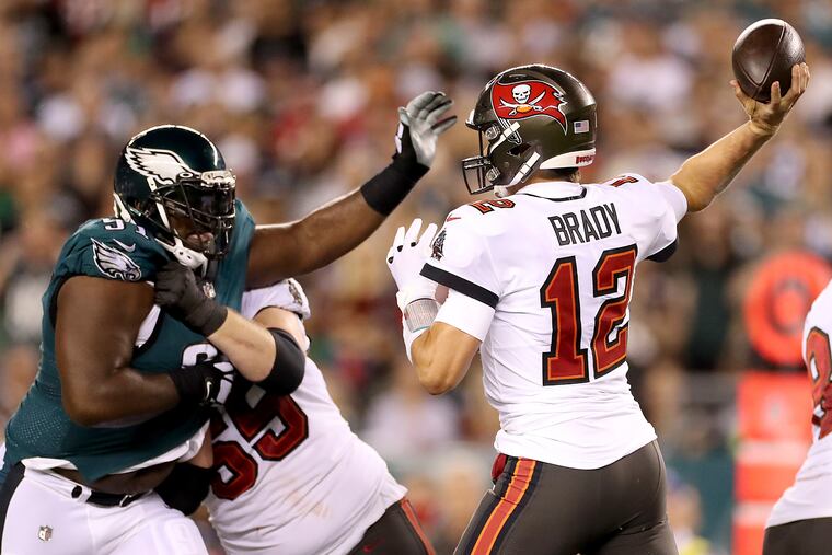 Philadelphia Eagles Fletcher Cox pressures Tampa Bay Buccaneers quarterback Tom Brady during their game at Lincoln Financial Field in Philadelphia, Pa. on October 14, 2021.