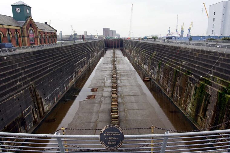 is near the new Titanic Belfast Visitors Center. Belfast longkept quiet about its link to the Titanic, which sank in April 1912. PETER MORRISON / Associated Press