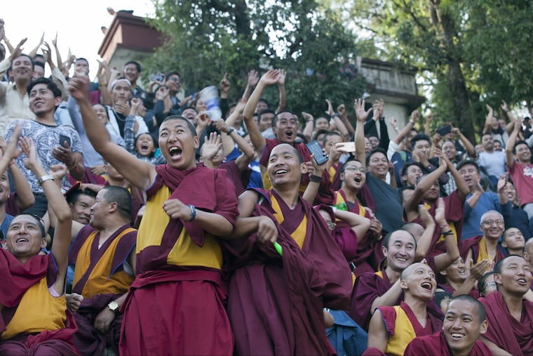 Exile Tibetan Buddhist monks cheer their team as they watch a soccer match in Dharmsala, India earlier this month. Soccer fans around the world are gearing up to watch the upcoming World Cup soccer tournament. In the United States, there's nothing to cheer about.