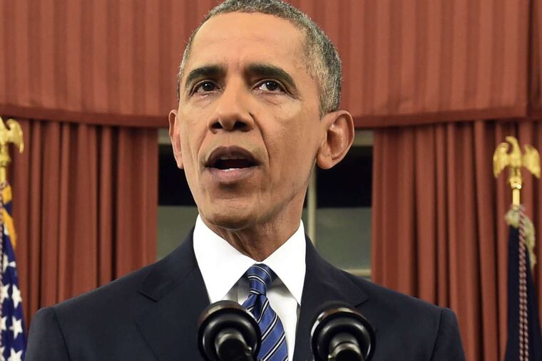 President Obama in the Oval Office on Sunday. He said the terror threat is real, "but we will overcome it."