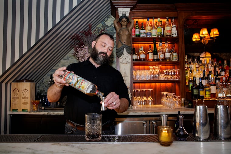 Bartender Paul MacDonald works on a Carousel cocktail at Friday Saturday Sunday on Wednesday, July 2, 2025 in Philadelphia.