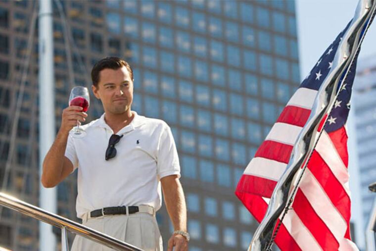This film image released by Paramount Pictures shows Leonardo DiCaprio as Jordan Belfort in a scene from "The Wolf of Wall Street." The movie is nominated for an Oscar for best motion picture of the year as well as four other nominations. This year's best picture race at the 86th Academy Awards on Sunday, March 2, 2014, has shaped up to be one of the most unpredictable in years. (AP Photo/Paramount Pictures and Red Granite Pictures, Mary Cybulsk, filei)