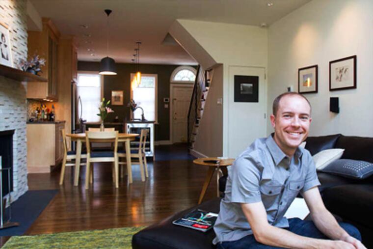From outside, the 170-year-old house in the city's Washington Square West neighborhood is a traditional brick rowhouse. Inside is a surprisingly modern interior.