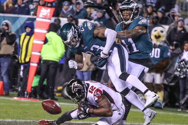 Eagles safety Rodney Mcleod, top, hits Atlanta reciever #12, Mohamed Sanu, on the ground and caused him to drop the ball, but was flagged for a personal foul and helped the Falcons to score theri only touchdown in the second quarter. The NFL Divisional Playoffs, Eagles versus the Falcons at Lincoln Financial Field on January 13, 2018. MICHAEL BRYANT/ Staff Photographer