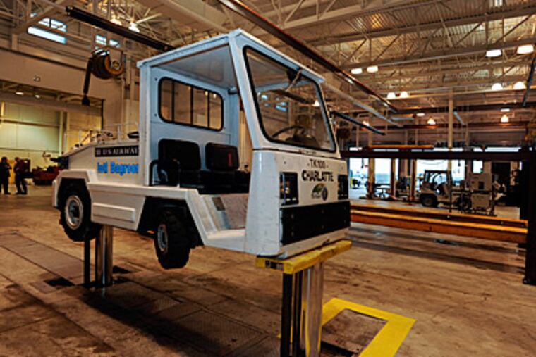 US Airways, Philadelphia International Airport's largest airline, opened a $22 million ground-service equipment shop Friday to expedite bringing bags to and from its flights.