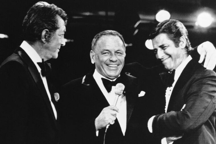 Frank Sinatra (center), on the annual muscular dystrophy telethon in 1976, brings on Dean Martin (left), Lewis’ old partner. It was the first time Martin and Lewis had appeared together since their comedy team broke up in the 1950s.