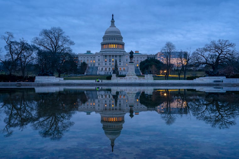 The Capitol is seen under early morning skies in Washington, Thursday, Dec. 20, 2018.
