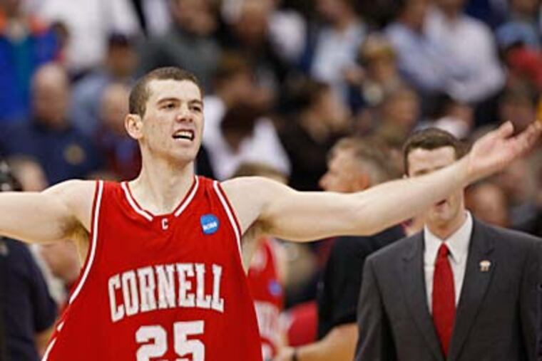 Cornell's Jon Jaques celebrates his team's 87-69 win over Wisconsin. (AP)