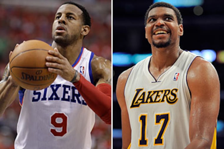 The Sixers have dealt Andre Iguodala and will receive Andrew Bynum in a four-team trade. (AP Photos)
