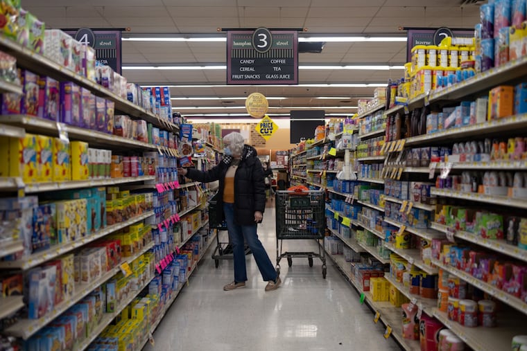 A shopper looks for items at Gerrity's Supermarket in Scranton, Pa.