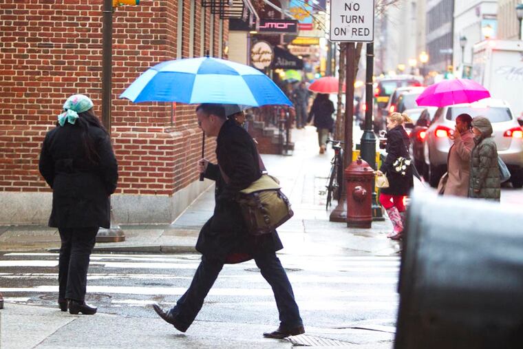 You'll need an umbrella, not snow boots, for the first day of winter. just as they did on this January day in 2014.
