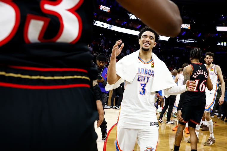 Oklahoma City Thunder guard Jared McCain greets Sixers forward Jabari Walker. McCain said that he would be happy to see teammates even if it's awkward to play against them.