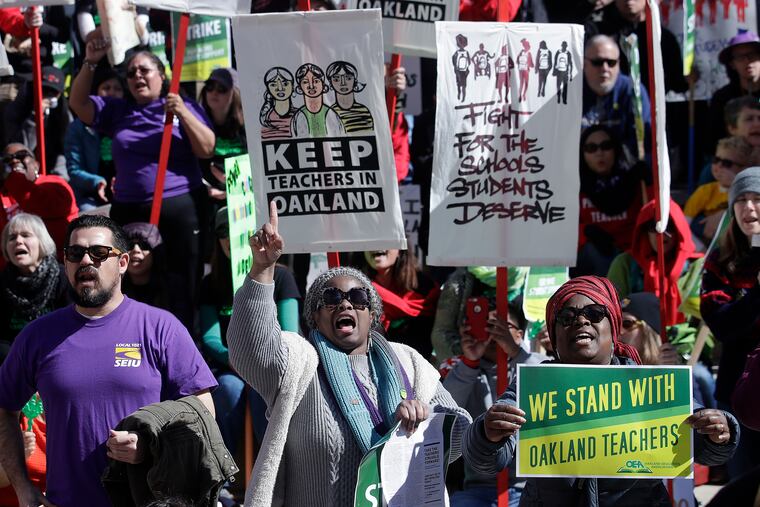 Teachers, students, and supporters rally at Frank Ogawa Plaza in front of City Hall in Oakland, Calif., on Feb. 21, 2019.