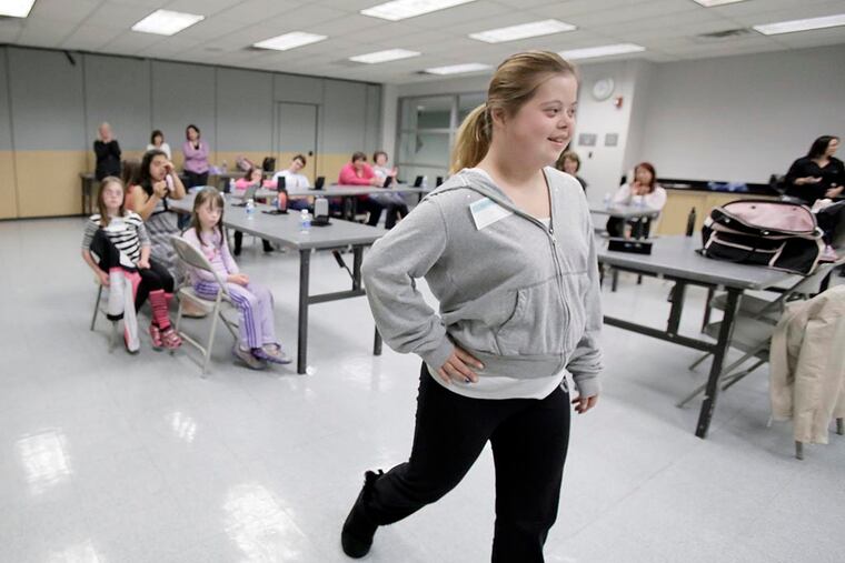 Kymbery Kropinski practices her runway walk at the Greater Plymouth Community Center in Plymouth Meeting on October 29, 2014. ( ELIZABETH ROBERTSON / Staff Photographer )