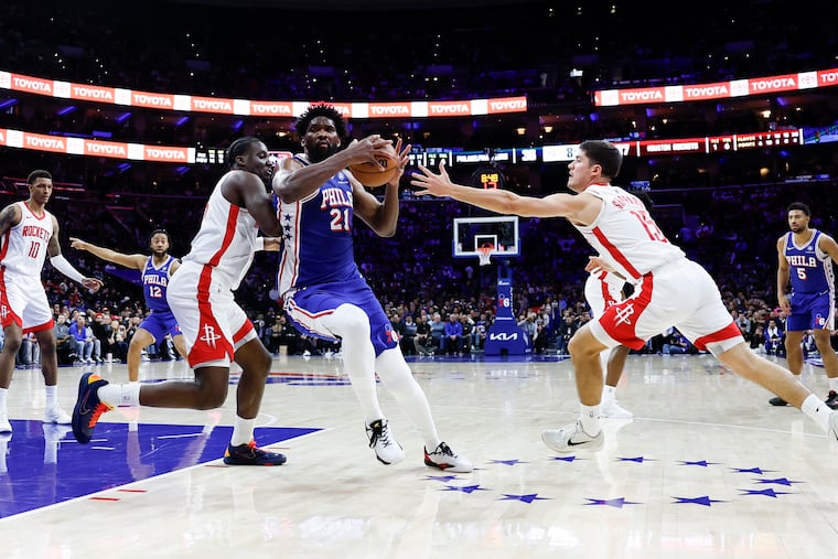 Sixers center Joel Embiid evoked his previous MVP form in a 128-122 overtime victory over the Rockets Thursday night.