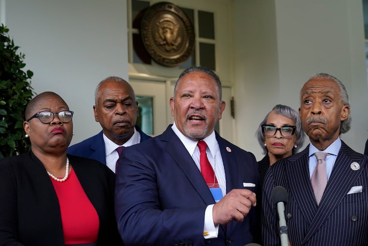 Marc Morial, center, president and CEO of the National Urban League, talks with reporters outside the West Wing of the White House in Washington, July 8, 2021, following a meeting with President Joe Biden and leadership of top civil rights organizations. The Urban League's new annual report warns of the consequences for Black Americans of the change in administration.