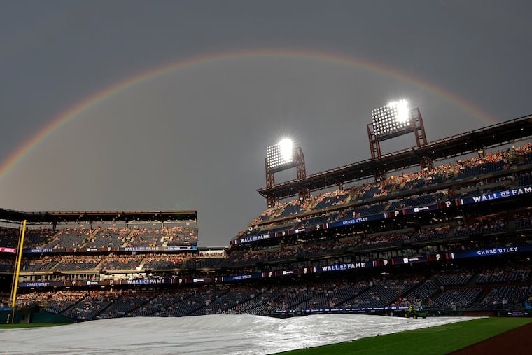 A rainbow sits over Citizens Bank Park before the Chase Utley Wall of Fame ceremony and the Phillies and Toronto Blue Jays game on Friday.