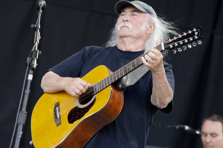 David Crosby of the band Crosby, Stills and Nash, performs at Glastonbury Festival in England, in 2009. Crosby, the brash rock musician who evolved from a baby-faced harmony singer with the Byrds to a mustachioed hippie superstar and an ongoing troubadour in Crosby, Stills, Nash & (sometimes) Young, has died at age 81.