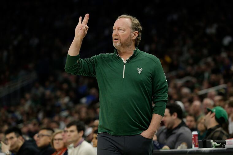 On April 3, 2022, Milwaukee Bucks head coach Mike Budenholzer calls out a play against the Dallas Mavericks at Fiserv Forum in Milwaukee.
