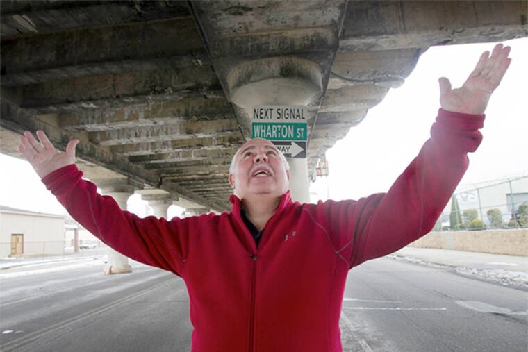 Ed Penna with the Ironworkers Local 405 underneath railroad bridge along S. 225th St. at Reed in s. Philadelphia on Friday, March 7, 2014. ( ALEJANDRO A. ALVAREZ / STAFF PHOTOGRAPHER )
