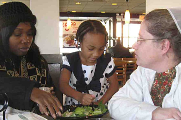 Audrey Manson gave birth to Majay, now 4, in jail and turned her over to Edith Wenger (right) in the Mennonite Caregivers Program. (Carolyn Davis/Staff)