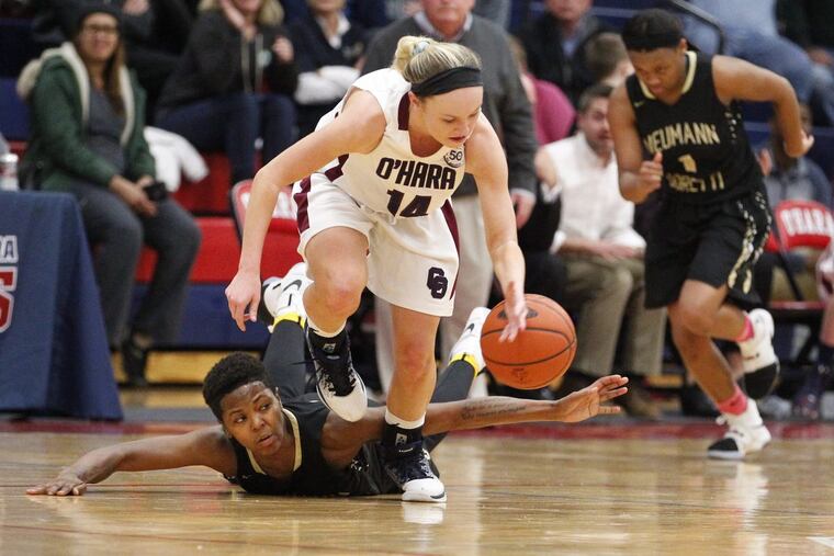 Mackenzie Gardler (center) of Cardinal O'hara comes up with a steal against China Nixon (left) of Neumann-Goretti during the 2nd quarter on Jan 11, 2017. CHARLES FOX / Staff Photographer