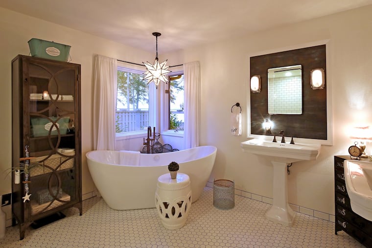 You could put an area rug in a bathroom this big, but make sure it's an outdoor rug so it can withstand getting wet. (Greg Gilbert/The Seattle Times/TNS)