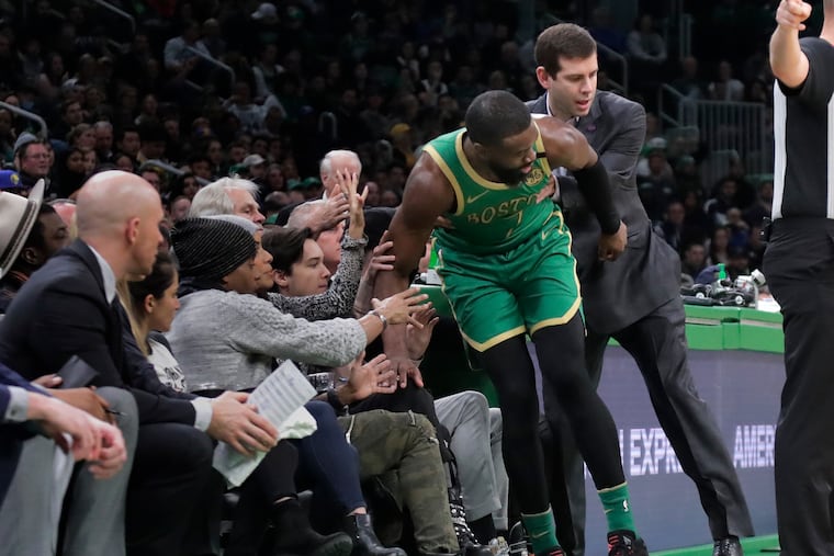 Brad Stevens (right), who coached Jaylen Brown for five seasons in Boston, said it was difficult to trade his former star to Philly.