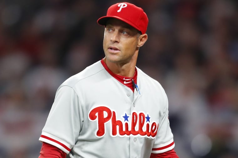 Philadelphia Phillies manager Gabe Kapler walks back to the dugout after a pitching change in the third inning of the Phillies 15-2 loss to the Braves.