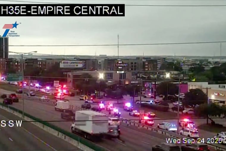 This traffic camera image shows a heavy police presence close to a U.S. Immigration and Customs Enforcement office in northwest Dallas on Wednesday, Sept. 24, 2025.