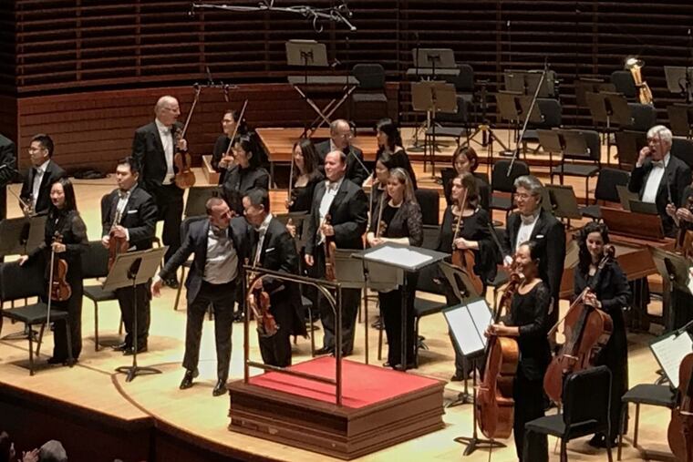 David Kim and Yannick Nezet-Seguin bow with the Philadelphia Orchestra