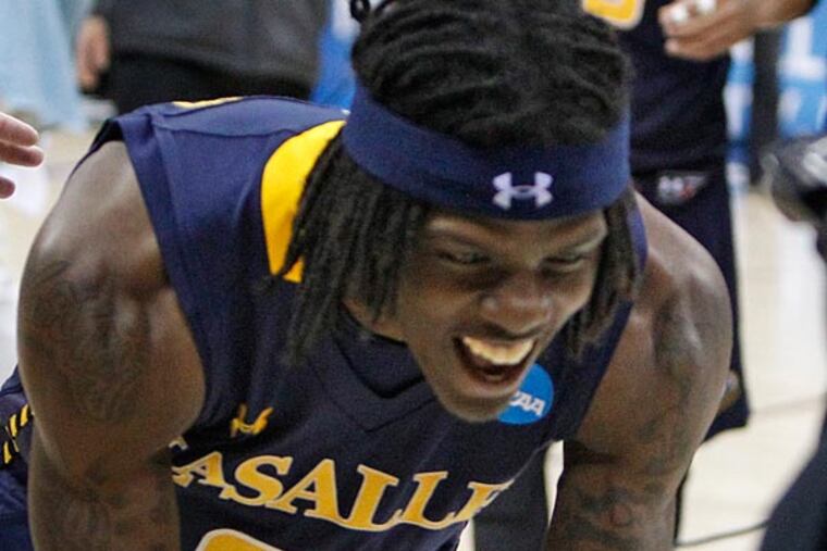 A day after introducing Southwest Philly Floater into the basketball lexicon, La Salle guard Tyrone Garland was as stunned by the attention. (Ron Cortes/Staff Photographer)